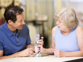 elderly woman having an occupational therapy